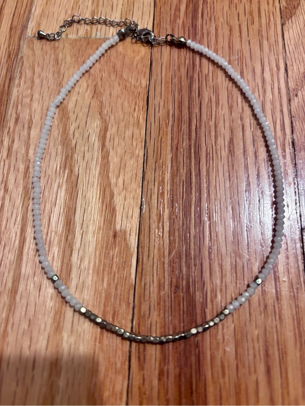 Delicate White Beaded Necklace with Gold Accent
